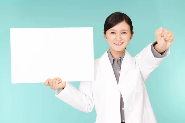 Smiling Asian Pharmacist Whiteboard — Stock Photo, Image