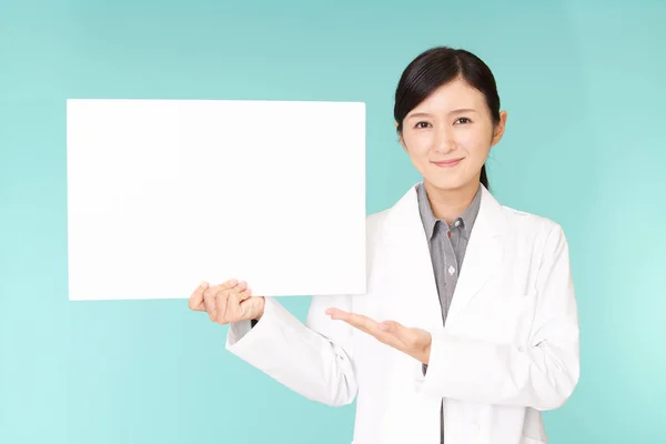 Smiling Asian Pharmacist Whiteboard — Stock Photo, Image