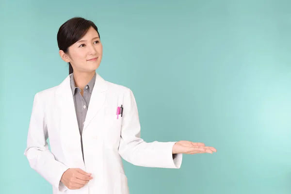 Asian Pharmacist Showing Something Palm Her Hand — Stock Photo, Image