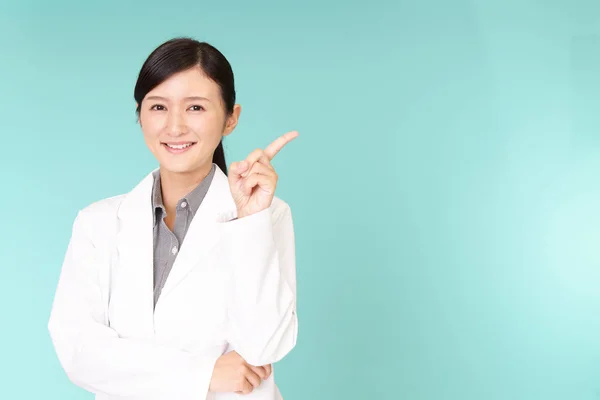 Asian Pharmacist Pointing Her Finger — Stock Photo, Image