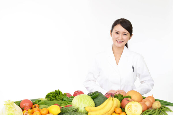 Picture of registered dietitian with fruits and vegetables