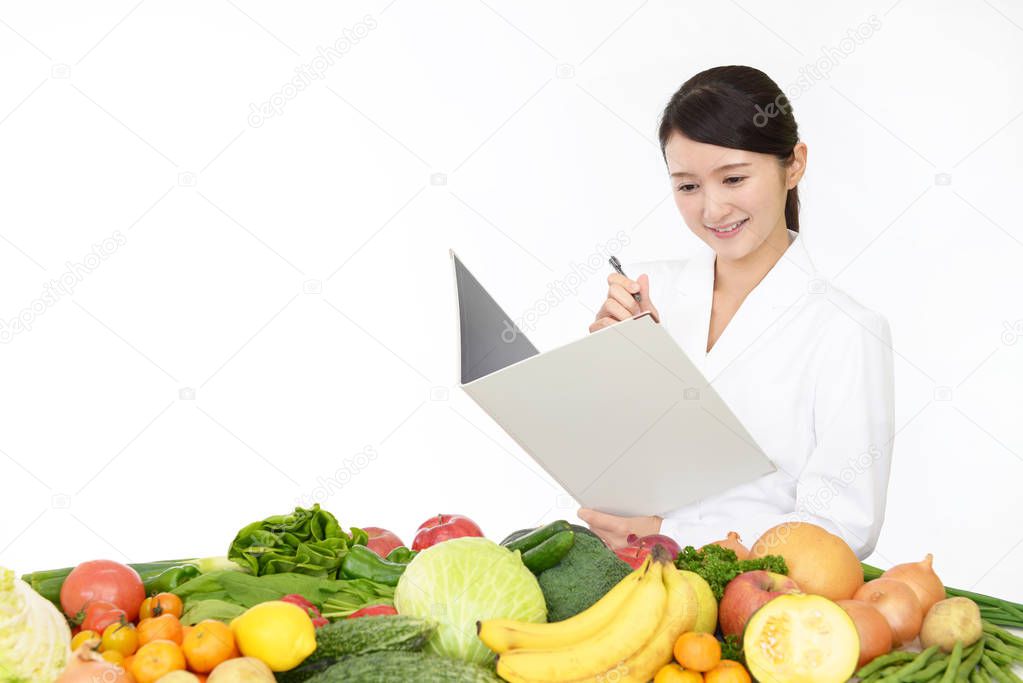 Picture of registered dietitian with fruits and vegetables