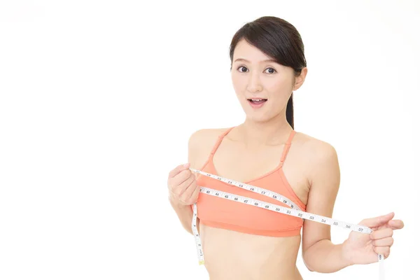 Young Woman Measuring Her Breast — Stock Photo, Image