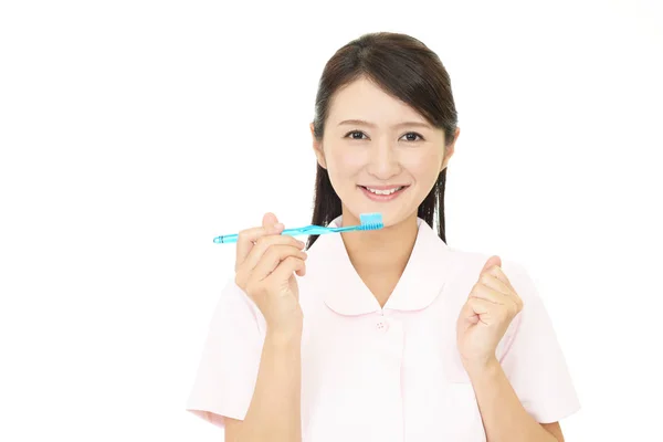 Smiling Dental Hygienist Toothbrush — Stock Photo, Image