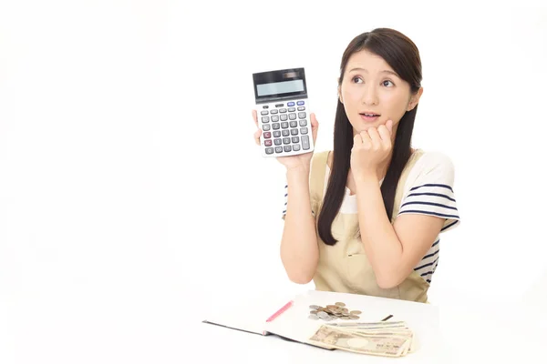 Mujer Decepcionada Con Una Calculadora —  Fotos de Stock