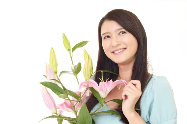 Mujer Feliz Sosteniendo Flores — Foto de Stock
