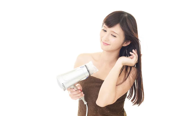 Young Woman Blow Drying Her Hair — Stock Photo, Image