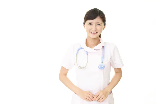 Χαμογελώντας Θηλυκό Νοσοκόμα Που Απομονώνονται Λευκό Φόντο — Φωτογραφία Αρχείου