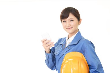 Female worker with a smart phone
