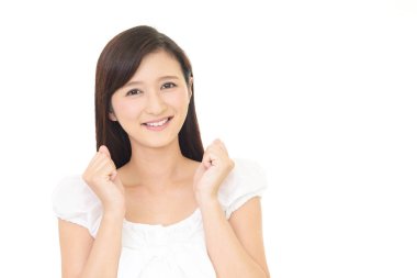 Beyaz arka plan üzerinde izole mutlu bir genç kadın