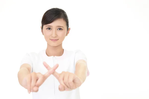 Asiatische Beauty Expertin Demonstriert Verbotene Geste — Stockfoto