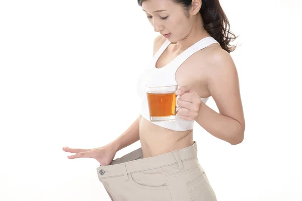 Mujer Pie Usando Pantalones Demasiado Grandes Después Perder Peso —  Fotos de Stock