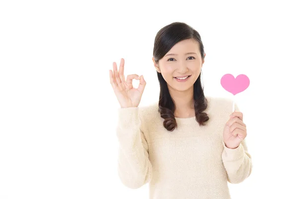 Smiling Woman Holding Pink Heart Love Symbol — Stock Photo, Image