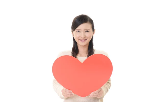 Sorrindo Mulher Segurando Vermelho Coração Amor Símbolo — Fotografia de Stock