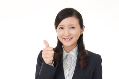 iş kadını yukarı işareti gösteriliyor