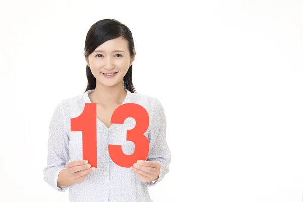 Smiling Young Woman Number — Stock Photo, Image