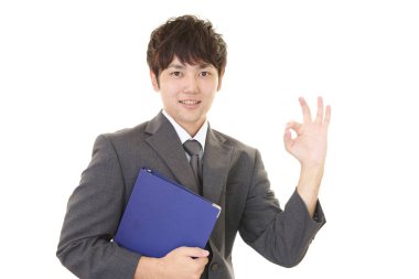 ok el işareti ile işadamı