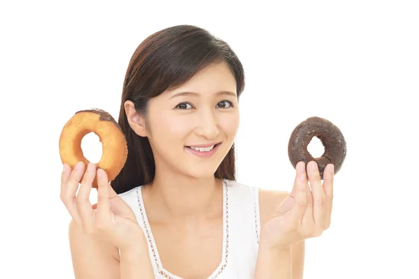 Asian Young Woman Eating Sweets — Stock Photo, Image