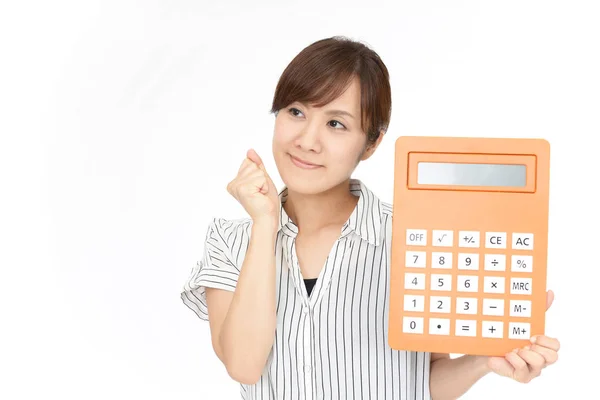 Mulher Sorridente Com Uma Calculadora — Fotografia de Stock