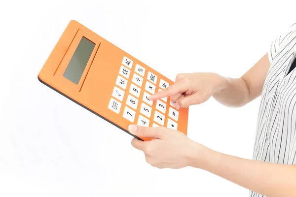 Mulher Usando Uma Calculadora — Fotografia de Stock