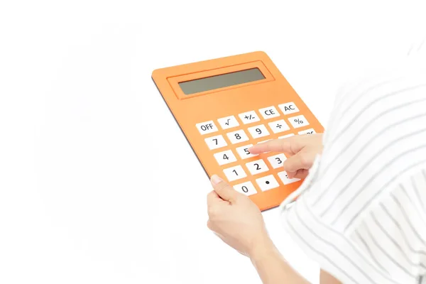 Woman Using Calculator — Stock Photo, Image