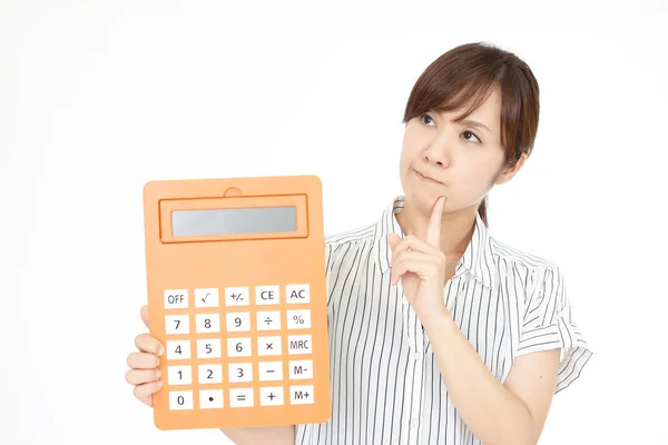 Mulher Decepcionada Com Uma Calculadora — Fotografia de Stock