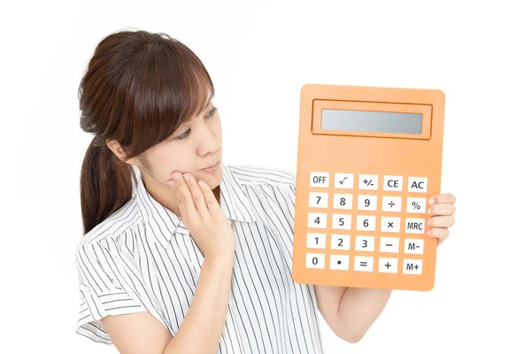 Mulher Decepcionada Com Uma Calculadora — Fotografia de Stock