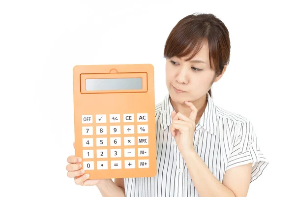 Femme Déçue Avec Une Calculatrice — Photo