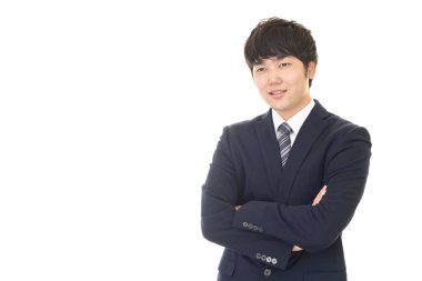 Asyalı işadamı kollarını kavuşturdu.