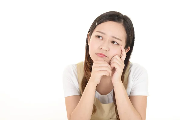 Uneasy Asian Housewife Isolated White Background — Stock Photo, Image