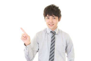 İşadamı parmağıyla işaret ediyor.