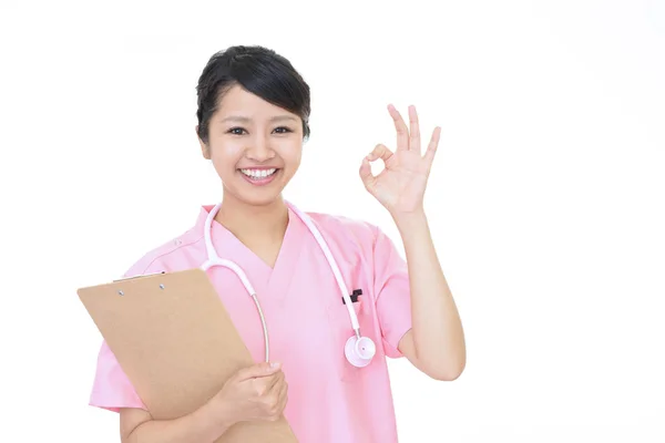 Χαμογελαστή Γυναίκα Νοσοκόμα Εντάξει Χέρι Πινακίδα — Φωτογραφία Αρχείου