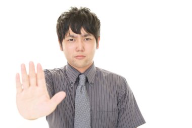 Dur işareti yaparak adam