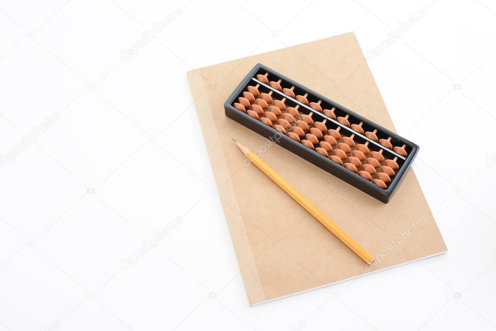 Abacus with notebook isolated on white background