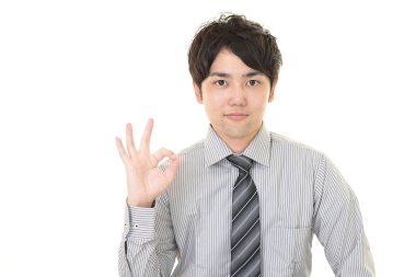 ok el işareti ile işadamı