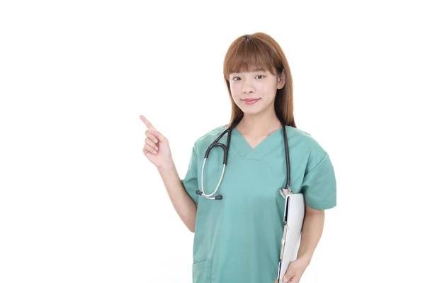 Ασιατικές Γιατρός Δείχνει Δάχτυλό Της — Φωτογραφία Αρχείου