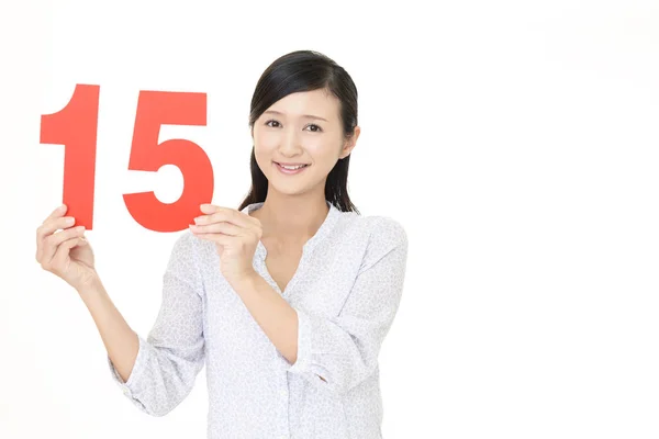 Woman Holding Number Fifteen — Stock Photo, Image