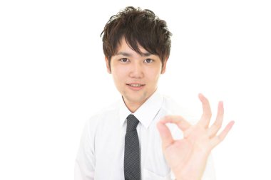 ok el işareti ile işadamı