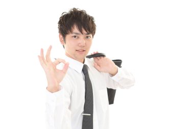 ok el işareti ile işadamı