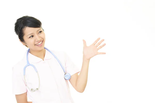 Enfermera Sonriente Aislada Sobre Fondo Blanco —  Fotos de Stock