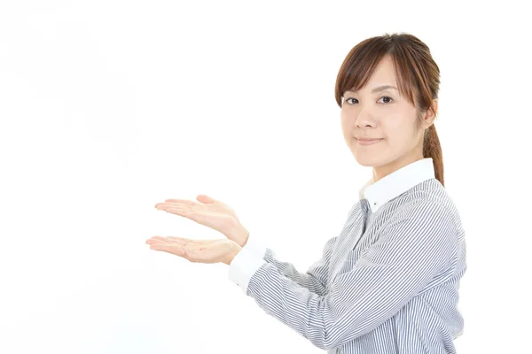 Woman showing something on the palm of her hands