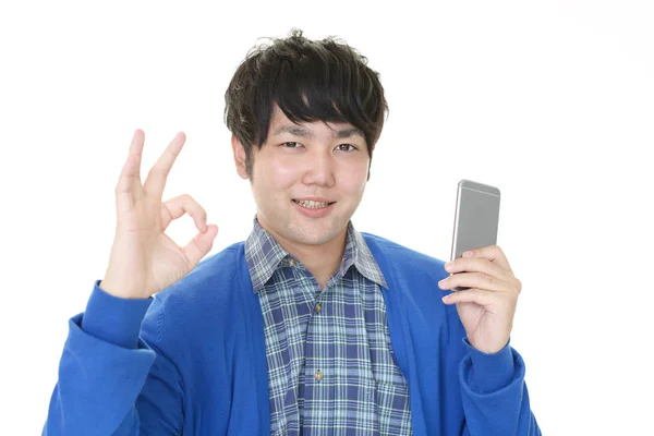 Happy Asian Man Holding Smart Phone — Stock Photo, Image