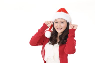 Young woman in Santa Claus cap