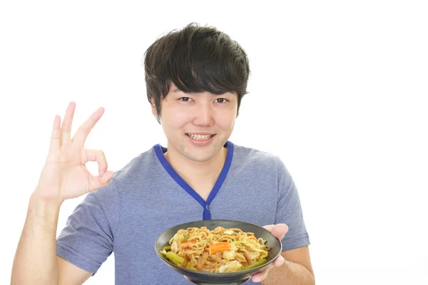 Asian Man Carrying Meal — Stock Photo, Image