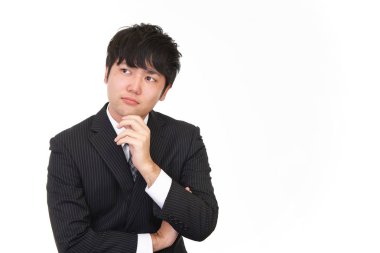 Huzursuz görünen bir iş adamı portresi