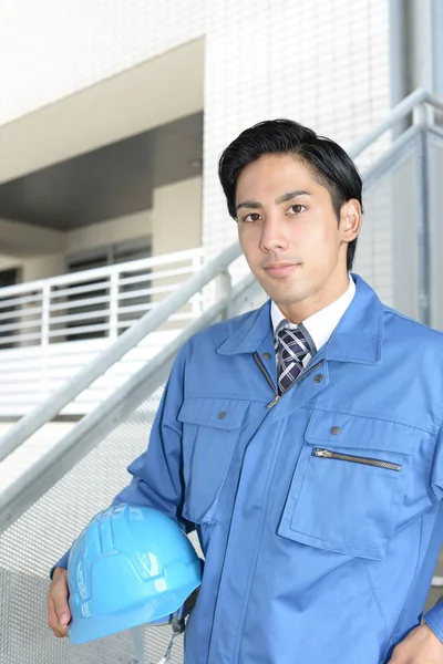 Asyalı bir işçinin portresi