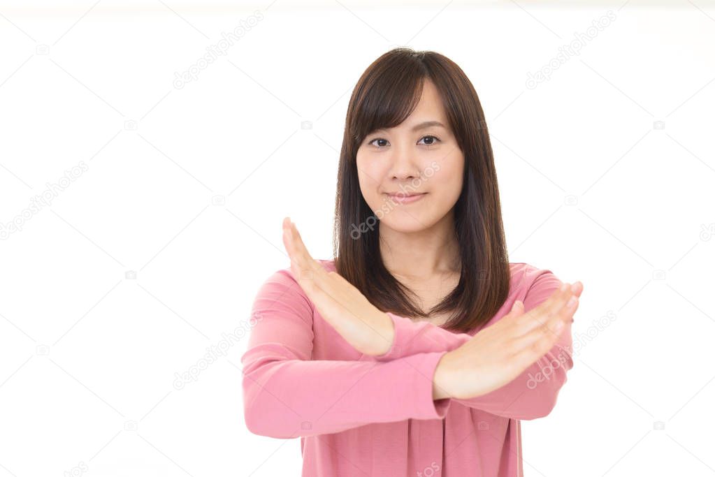 Woman demonstrating prohibiting gesture