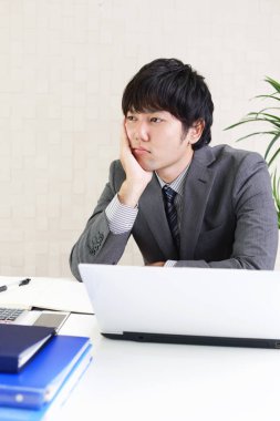 Asya işadamı yorgun ve stresli hissediyor