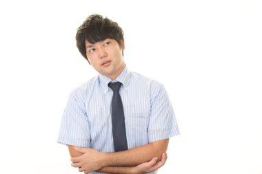 Huzursuz görünen bir iş adamı portresi