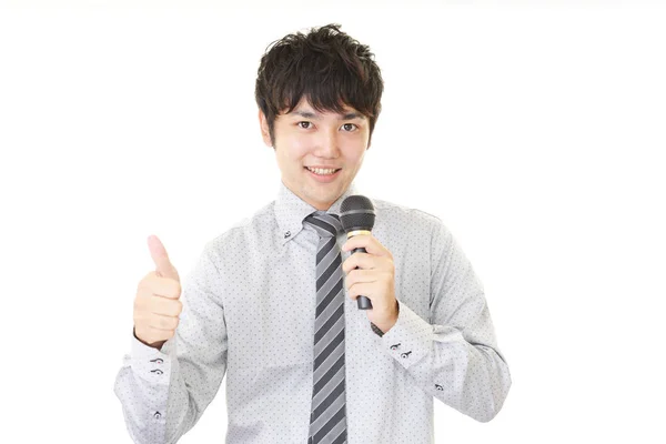 Asian Businessman Holding Microphone — Stock Photo, Image